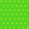 Green background with yellow polka dots.
